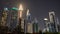 The streets of the night city and skyscrapers of Dubai. Timelapse.