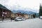 Streets of the tourist town of Mestia of the Svaneti region with classic houses surrounded by the Caucasus Mountains