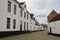 Streets with white painted brick houses of the Holy corner or Old Saint Elisabeth beguinage, Ghent