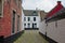 Streets with white and red painted brick houses of the Holy corner or Old Saint Elisabeth beguinage, Ghent