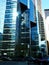 Streetscape with blue glass office building in Toronto