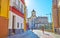 The streetscape with old bell tower, Malaga, Spain