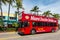 Streetview of the historical Art Deco District of Miami South Beach with a hop-on hop-off tourist bus