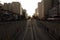 Streetview of Vehicle traffic and buildings at evening, in Sao Paulo