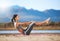 Strengthen your core. Shot of a young woman exercising outdoors.