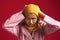 Stress. Young Asian muslim teenage girl frustrated holding hear head, woman wearing hijab with angry look