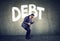 Stressed business man under debt pressure financial burden