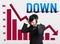 Stressed businessman with falling down business chart