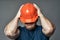 Stressed engineer in hardhat