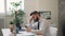 Stressed guy reading business contract shaking head throwing pen in office