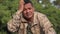 Stressed Hispanic Male Soldier Wearing Camo Ptsd