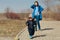 Stressed Mother Supervising Child Playing Outdoors