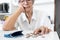 Stressed senior woman is counting remaining coins from pension,old elderly counting last money coins in her purse,financial