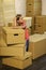 Stressful situation. Divorce and separation. Family problem. Forced to move. Girl child and boxes. Move out concept