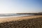 Stretch of Beach Divided by Pier