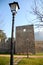 Stretch of the medieval walls of Monselice in the province of Padua in the green of the grass and the blue sky in Veneto (Italy)