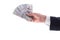 The stretched hand of businessman with cash.