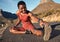 Stretching legs, fitness and black woman in the street for health training, sports and running smile. Happy, warm up and