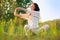 Stretching woman in outdoor exercise smiling happy doing yoga