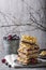 Streusel pie with currant and rose petal filling on a light background.