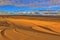 Striated Desert Sand Pattern with Mountains in the background