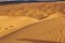 Striated Desert Sand Pattern with Mountains in the background