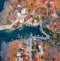 Stright down view from flying drone of Vathi port. Wonderful summer scene of Peloponnese peninsula, Greece, Europe.