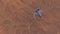 Strike Fighter Jet Aircraft High Altitude Above Arid Mountain Desert with Sediment Mudflat