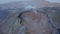Striking aerial view circling around Fagradalsfjall smoky crater cone, Iceland, day