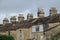 Striking chimneys on the roof in the city Bath.