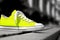 Striking Neon Yellow Sneaker on Monochrome Background