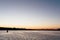 Striking sunset above the lake with bright clouds and sky