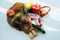 String bag with various fresh vegetables on white background