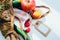 String bag with various fresh vegetables on white background