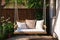 String Swing With Pillow On Patio, Surrounded By Garden