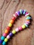 Stringing beads as a bracelet