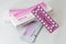 Strip and box of Organon Mercilon contraceptive pills closeup.