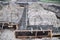 Strip footing, foundation construction. A close-up of a strip house foundation with a dug trench, wood frame and reinforcement