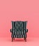 Striped chair on pastel color background