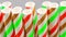 Striped cocktail tubules, holiday concept, camera movement, close-up