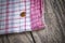 Striped dish cloth on brown wood