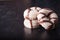 Striped donuts on dark wooden table in studio photo