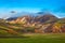 Striped mountains of rhyolite covered sunrise