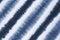 Striped tie dyed pattern on cotton fabric abstract background.