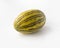 Striped yellow with green stripes oblong melon on a white background