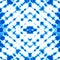 Stripped indigo background. Tie dye textile pattern with blue and white palette.