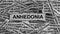 Strips of newspaper with the word Anhedonia