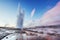 Strokkur geyser eruption in Iceland. Fantastic colors shine through the steam.