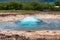 Strokkur Geyser eruption, natural hot spring pulsing in national park