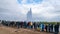 The Strokkur geyser in Iceland is erupting while tourists are looking